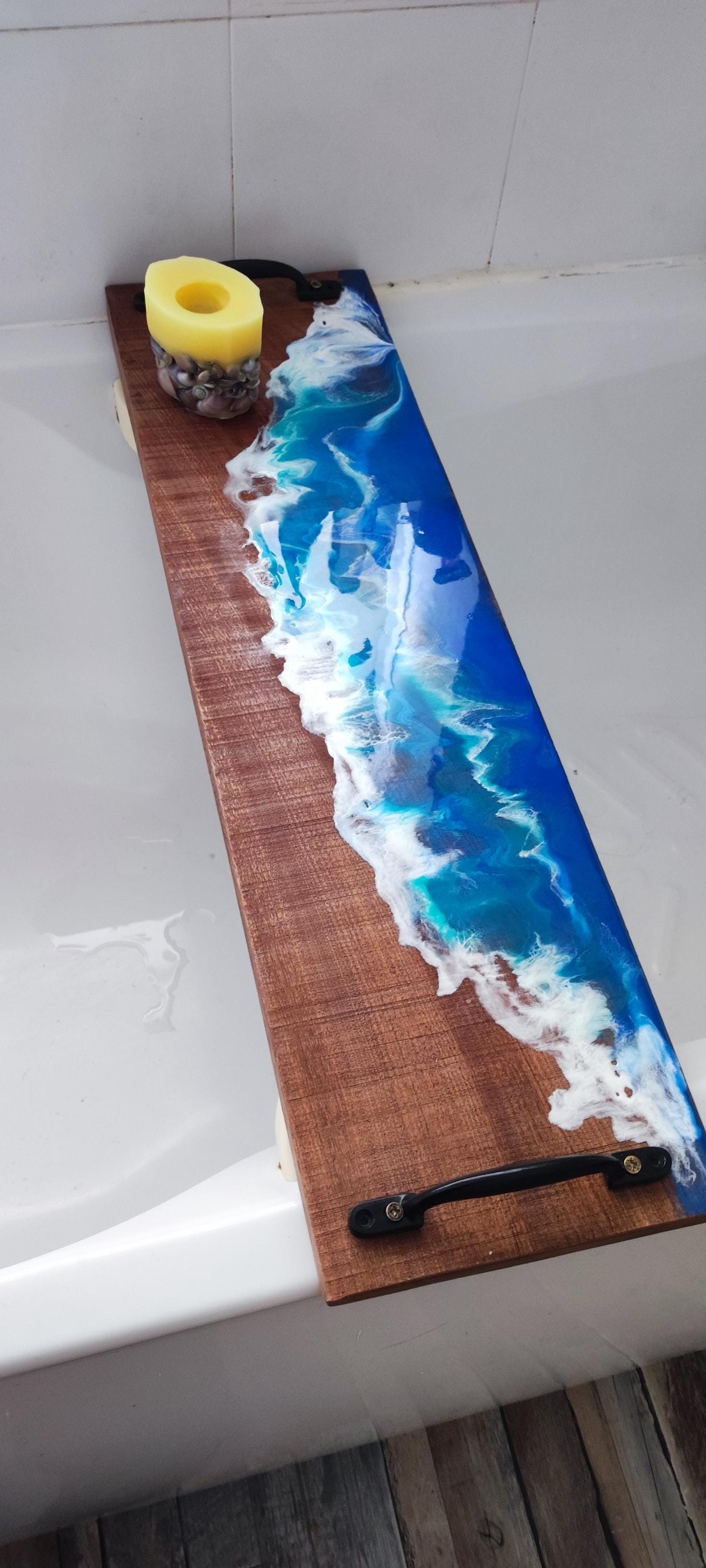 Sapele wood bath tray with resin ocean waves