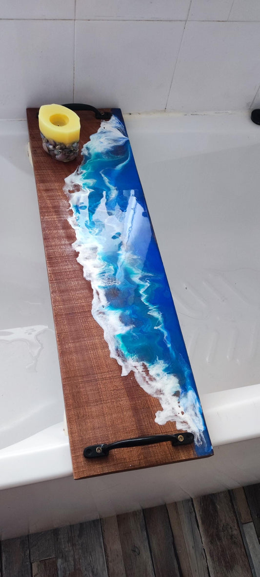 Sapele wood bath tray with resin ocean waves